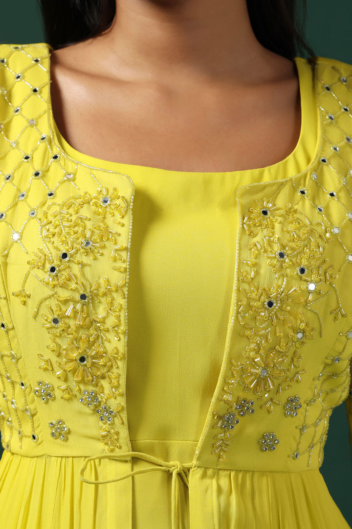 YELLOW ANARKALI WITH EMBROIDERED CAPE