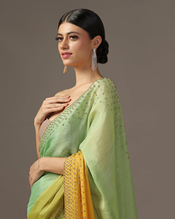 LIGHT  GREEN AND  YELLOW  OMBRE SAREE WITH A DELICATE GOLDEN BORDER