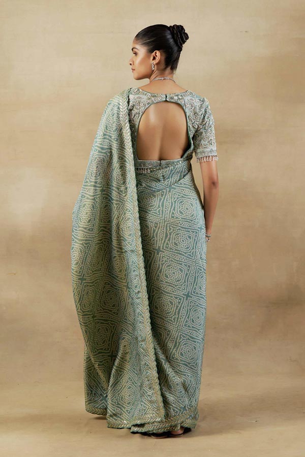 GREEN BANDHANI TISSUE SAREE WITH EMBROIDERED BLOUSE