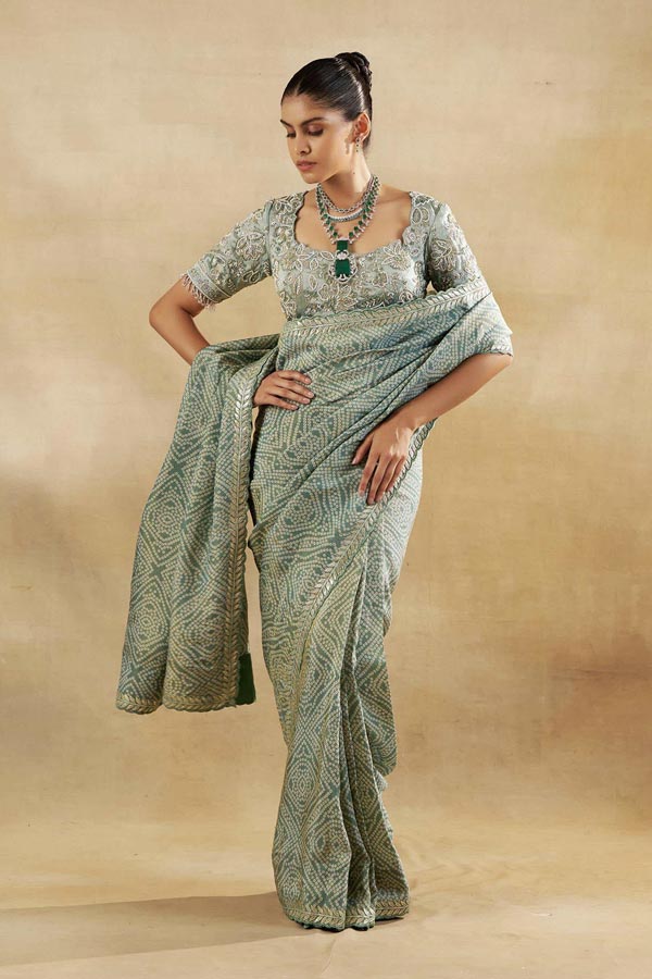 GREEN BANDHANI TISSUE SAREE WITH EMBROIDERED BLOUSE