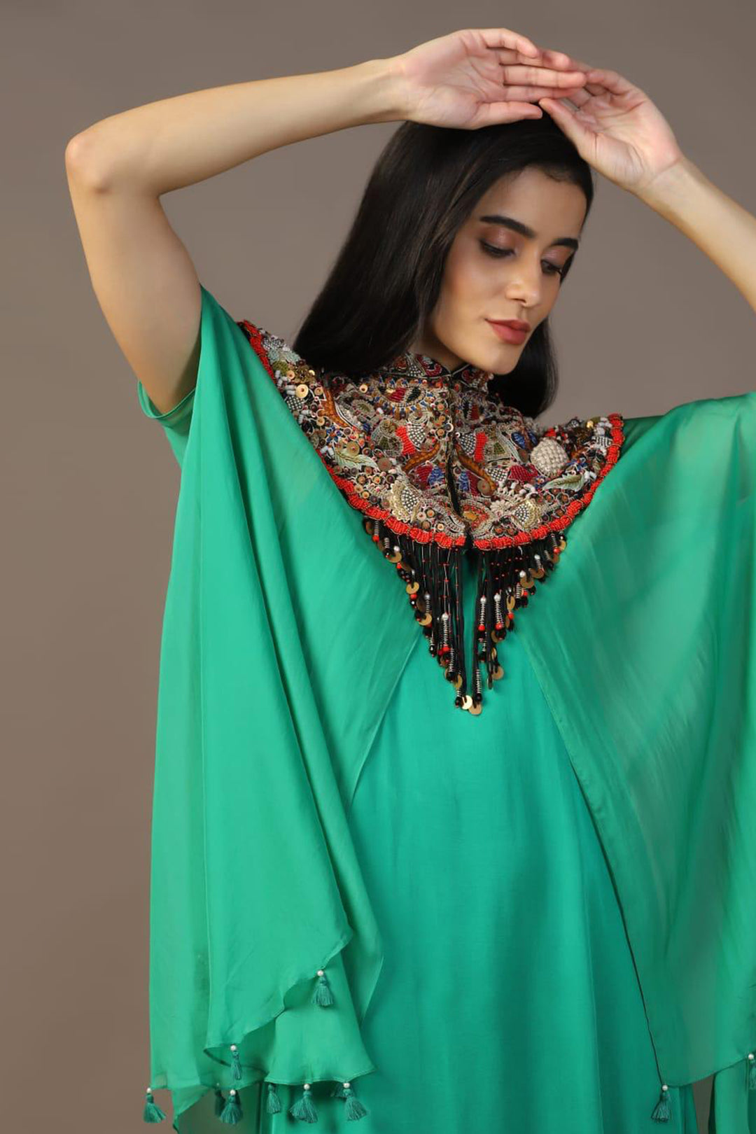 LEAF GREEN GOWN WITH EMBROIDERED CAPE