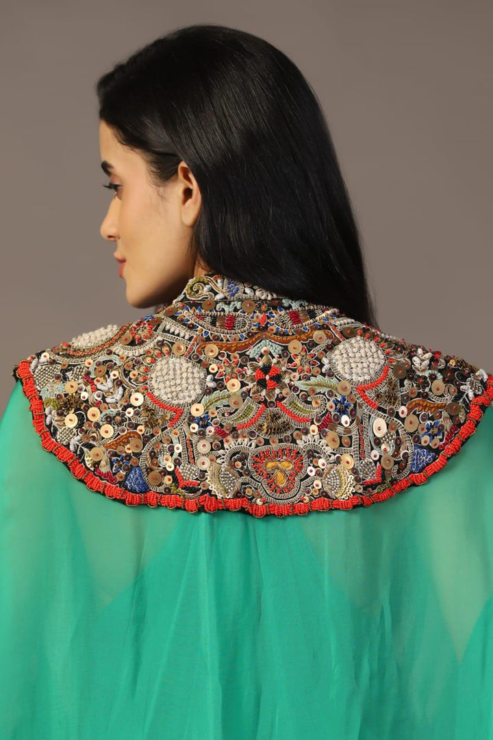 LEAF GREEN GOWN WITH EMBROIDERED CAPE