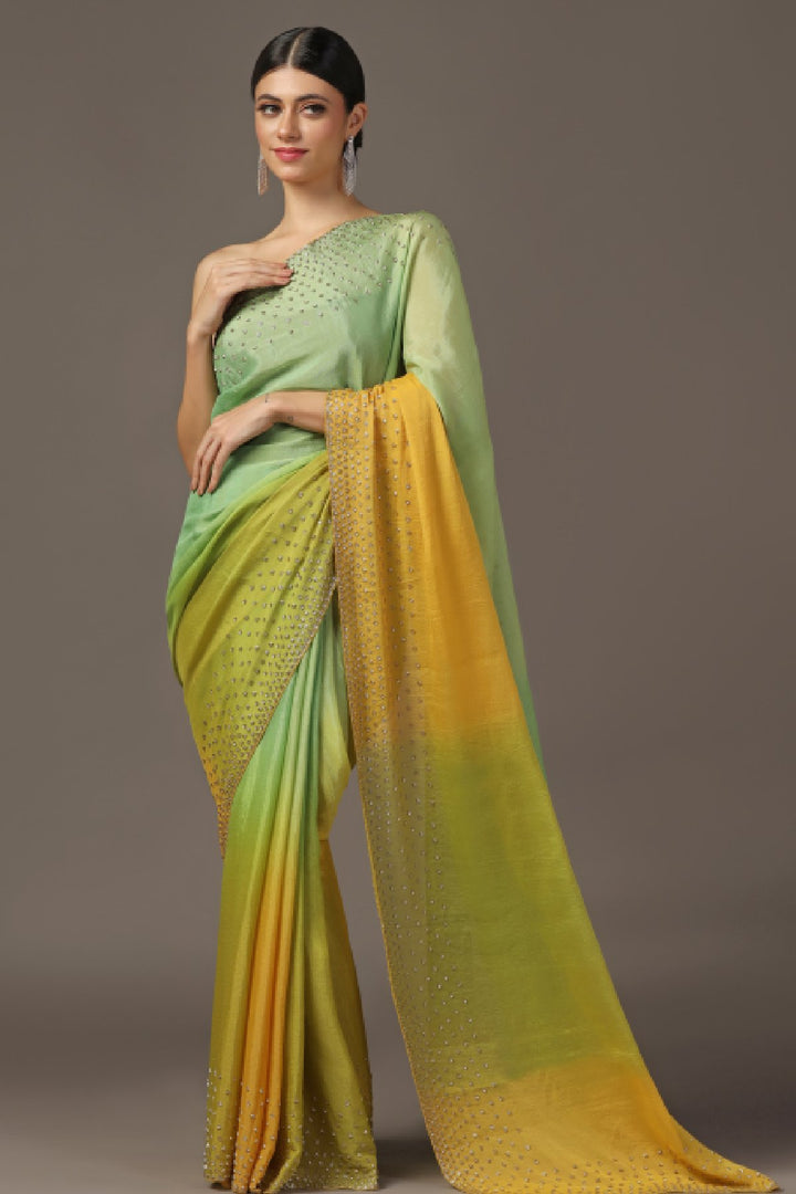 LIGHT  GREEN AND  YELLOW  OMBRE SAREE WITH A DELICATE GOLDEN BORDER