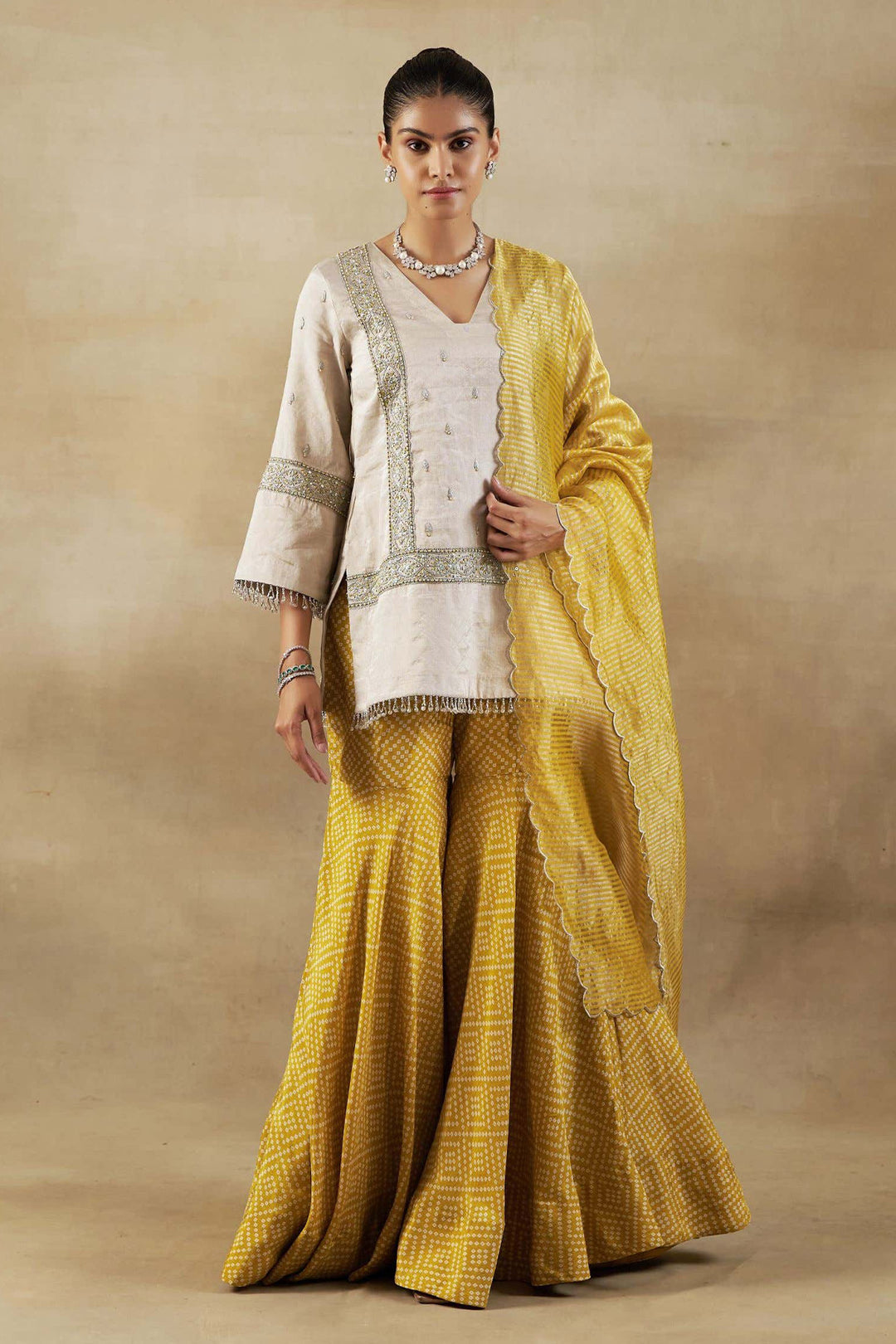 Silver Tissue Short Kurta with Mustard Bandhani Garara and Gold