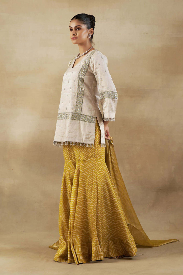 Silver Tissue Short Kurta with Mustard Bandhani Garara and Gold Self Weave Zari Dupatta