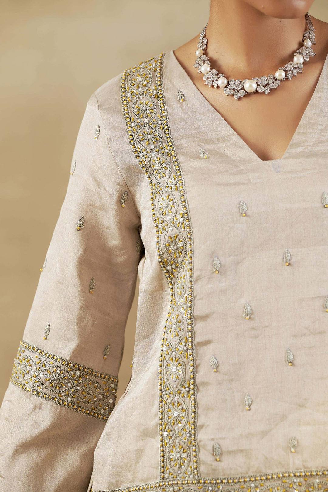 Silver Tissue Short Kurta with Mustard Bandhani Garara and Gold Self Weave Zari Dupatta