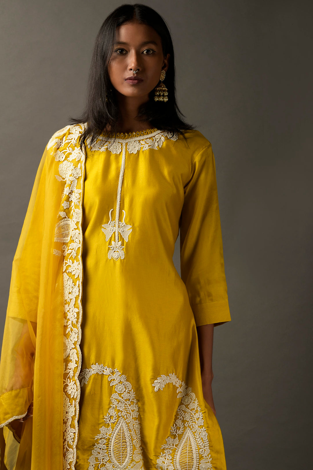 Mustard Yellow with White Potli Work Suit